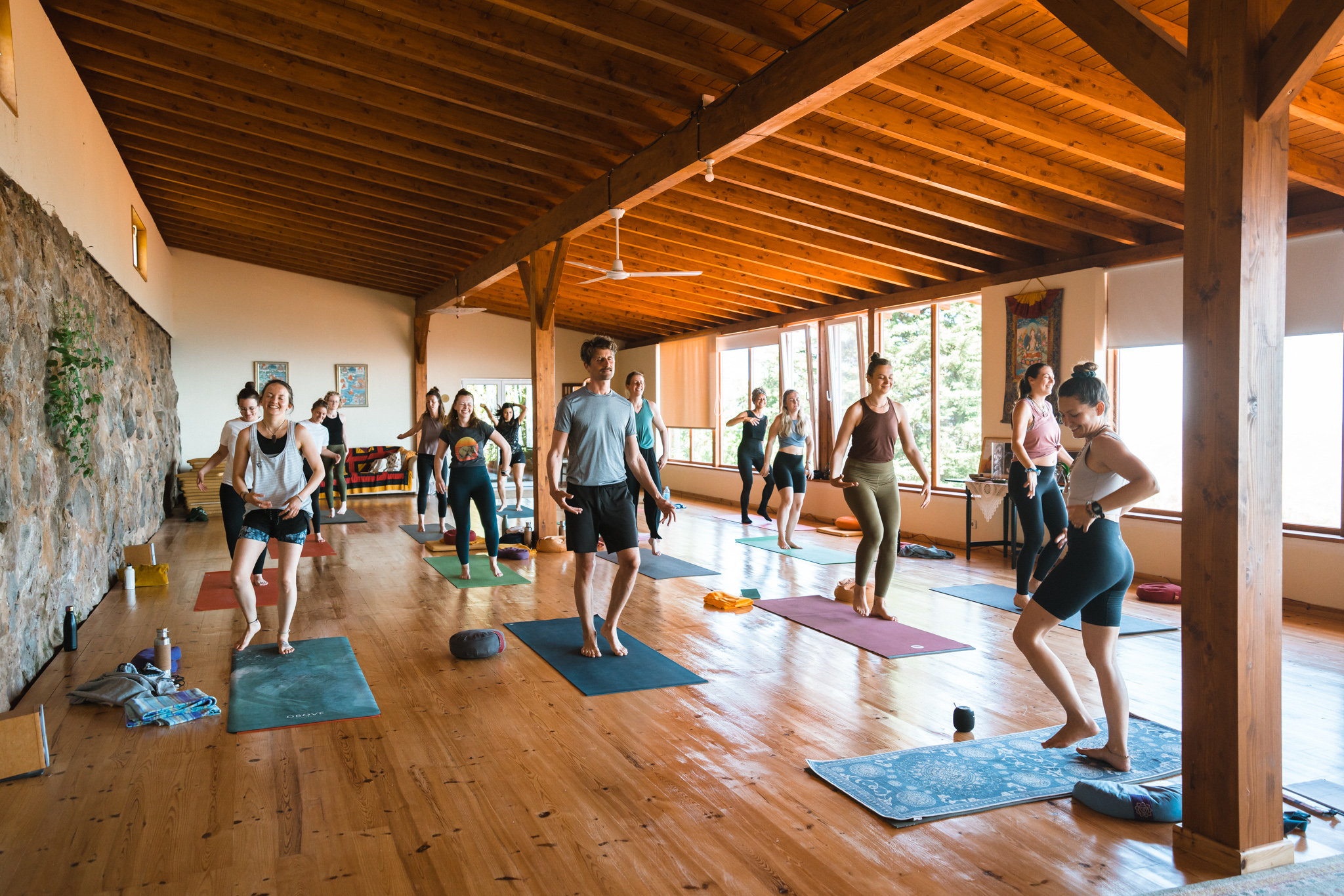 Yoga retreat Algarve – group yoga class in indoor wooden hall Monchique