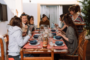 Retreat community Portugal – shared dinner table lifestyle photography